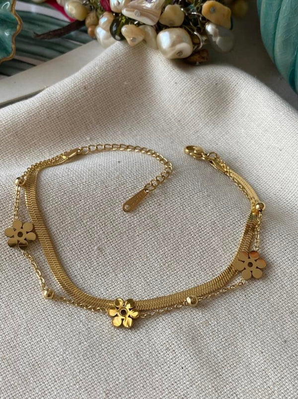 سوار أزهار ذهب