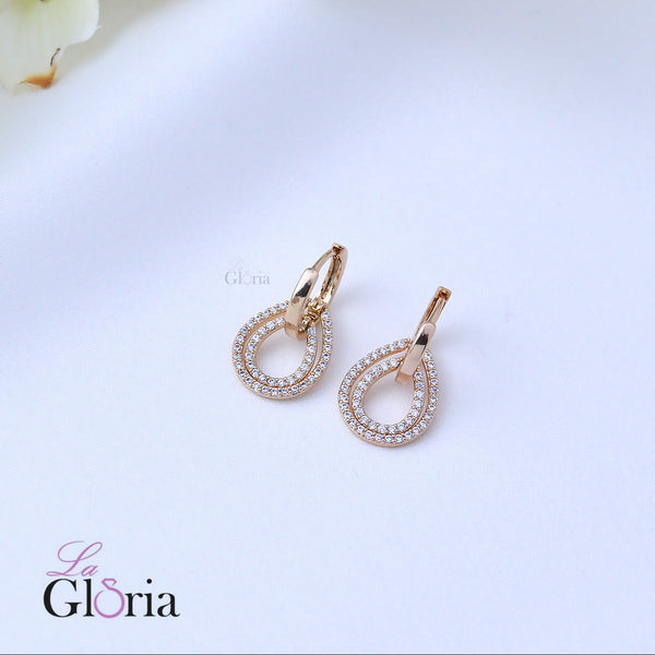 حلق دمعة مرصع بألماس