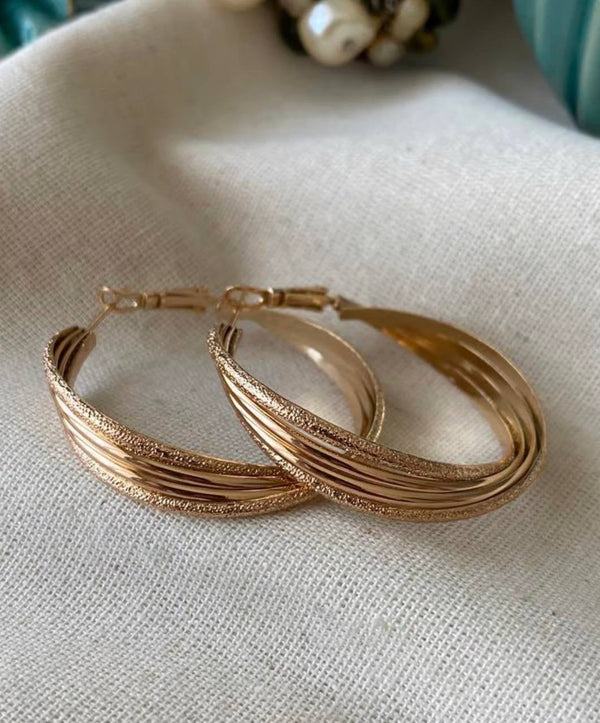 حلق دائري ذهبي متعدد الطبقات